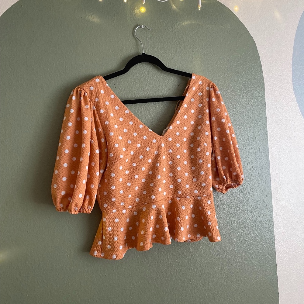 Peach colored Polka Dot Peplum Blouse